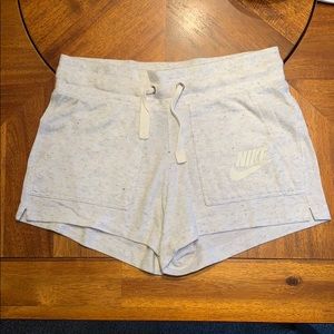 White Nike shorts with black speckles